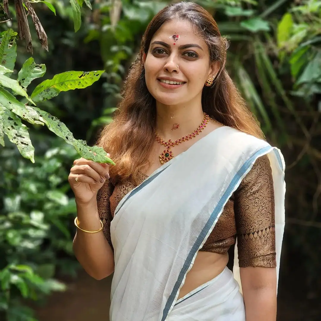 Malayalam Actress Anusree Nair in White Saree Black Blouse